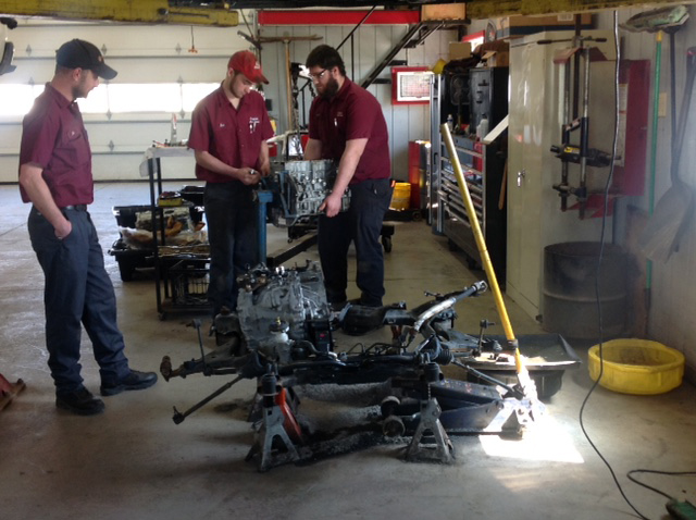 Croghan Team Working On An Engine